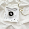 Detail of round phone socket with silver bow and pearl trim on white marble tray - Metal Bracket - Round Pearl Bow / Black