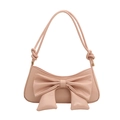 Schicke rosa Schultertasche mit großer glänzender Schleife und modischen Knotengurten - Rosa