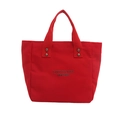 Red canvas tote bag with black letter embroidery and silver rivet reinforcements - Red