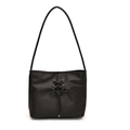 Minimalist black shoulder bag with cross-strap lace-up detail and large capacity - Black