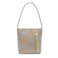 Elegante borsa a secchiello orientale dorata con ricamo floreale e nappa di seta bianca - Bianco