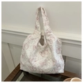 Dettaglio della borsa tote in tela con motivo floreale a farfalla e trama jacquard - Rosa