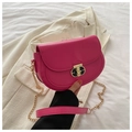 Detail of rose pink saddle bag with gold chain strap and modern metal buckle closure - Rose Pink