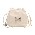 Cream white drawstring bucket bag with a stylish metallic butterfly ornament and chain - White