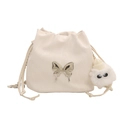 Creamy white bucket bag with silver butterfly buckle and plush charm detail - White with Pendant