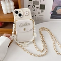 Detail of white leather iPhone case featuring a Queen crown badge and pearl bow strap - Apricot / iPhone 7/8/SE 2020