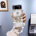 Detail of luxury rhinestone butterfly phone case for Z Flip 6 with crystal bead handle - White / Samsung ZFlip3