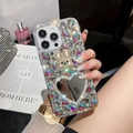 Close-up of luxury rhinestone iPhone case featuring a gold rabbit and heart mirror - AB White Heart Mirror Rabbit Style / iPhone 15 Promax