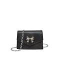 Chic black crossbody bag with sequin detail and silver bow accent on white background - Black
