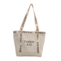 Off-white canvas tote bag with black FASHION BAG prints and durable webbed handles - White
