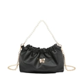 Chic black pleated cloud bag with pearl handle, gold butterfly detail and chain strap - Black