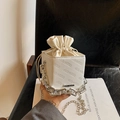 White minimalist box bag with embossed logo and silver chain handle for women - White