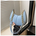 Detail of light blue pleated dumpling bag with chunky gold chain and soft leather texture - Blue