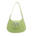 Chic light green crescent shoulder bag with silver bow accent and adjustable strap - Green