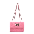 Pink quilted crossbody bag featuring a silver butterfly buckle and woven chain strap - Pink
