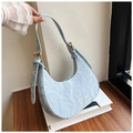 Light blue crescent shoulder bag with crinkle texture and gold fashion lettering - Blue