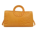 Orange yellow crocodile pattern handbag with circular top handles and sleek glossy finish - Yellow