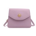 Minimalist lavender leather crossbody bag with a polished golden shield buckle - Purple