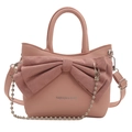Pink crossbody bag with large suede bow and silver fashion logo lettering on white background - Pink