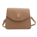 Minimalist tan leather crossbody bag with elegant round gold buckle and flap closure - Khaki