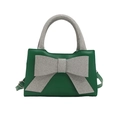 Elegant emerald green crossbody bag with sparkling silver bow detail and top handle - Green