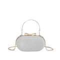 Elegante silberne Glitzer-Abendtasche mit goldener Handtasche und Schleifenverschluss - Silber