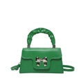 Emerald green crossbody bag with ruched ring handle and silver bow detail in a trapezoid shape - Green