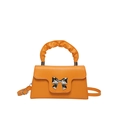 Mini orange crossbody bag with a ruched top handle and silver mirror bow buckle - Orange