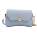Light blue faux leather handbag with golden buckle and chain strap on white background - Blue