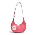 Pink crescent hobo bag with adjustable strap and white flower charm detail - Pink
