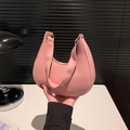Pink minimalist hobo shoulder bag for women with smooth leather texture and zip closure - Pink