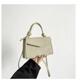 Minimalist beige crossbody bag with knotted handle detail and V-shaped flap cover - White
