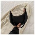 Minimalist black PU leather half-moon shoulder bag with gold hardware and red lining - Black
