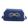 Royal blue crossbody bag with sparkling rhinestone double bow and wavy flap design - Blue
