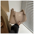 Detail of beige shoulder bag with gold hardware and stylish knotted strap design - Khaki