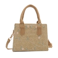 Straw woven handbag with pink floral embroidery and detachable strap on white background - Khaki