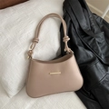 Minimalist beige leather underarm bag featuring knotted straps and a gold metal bar - Khaki