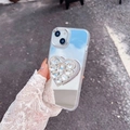 Close-up of sparkling heart-shaped rhinestone phone case with a practical mirror finish - White (Electroplated Mirror + Large Rhinestone Heart Stand) / iPhone 7/8/SE 2020