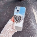 Close-up of heart-shaped diamond phone socket on mirror case for iPhone series - Grey (Electroplated Mirror + Large Rhinestone Heart Stand) / iPhone 7/8/SE 2020