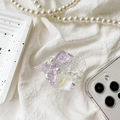 Dettaglio del supporto per telefono con perle, rose in resina e glitter su sfondo bianco - Viola - Colla per Paillettes Fiore Laser Sirena