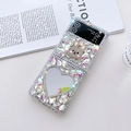 Detail view of luxury Samsung Z Flip case with sparkling crystals, bunny charm, and heart mirror - Rainbow White - Rabbit Heart Mirror (Full Diamond) / Samsung Z Flip 3