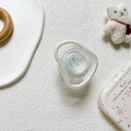 Irregular transparent glitter phone socket grip with sparkling accents on a white case - Glitter Planet-Blue