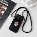 Detail of iPhone crossbody case featuring a leather wallet with a 3D pink rose and strap - Black / iPhone 7/8/SE 2020