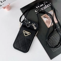 Detail of black quilted leather phone case with smile lettering and card holder - iPhone 15 Pro Max / Black