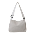 Minimalist cream corduroy tote bag with adjustable shoulder strap and zipper closure - White