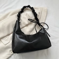 Black ruched crescent shoulder bag with ribbon bow detail on the handle in smooth leather - Black