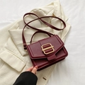Burgundy litchi leather crossbody bag with gold buckle and top handle minimalist style - Burgundy