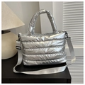 Detail of silver metallic quilted puffer tote bag with adjustable shoulder strap - Silver