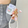 Detailansicht der transparenten Kopfhörerhülle mit Mint-Herz, Schleife und Perlenkette - Transparent Rosa Herz Schleife (Mit Perlenkette) / AirPods 1/2. Generation