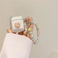 Detail view of transparent AirPods case with glitter heart and colorful beaded lanyard - AirPods 1/2 Gen